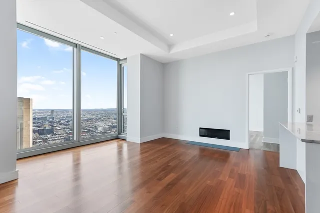a bathroom with granite countertop a sink and a mirror