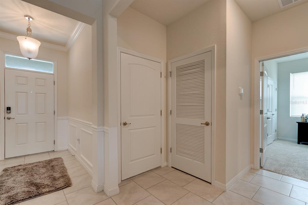 1706 Red Rock Road New Smyrna Beach, FL 32168 - Photo 4 of 27 a view of a bathroom with mirror