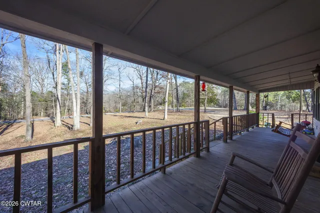 a living room with large windows