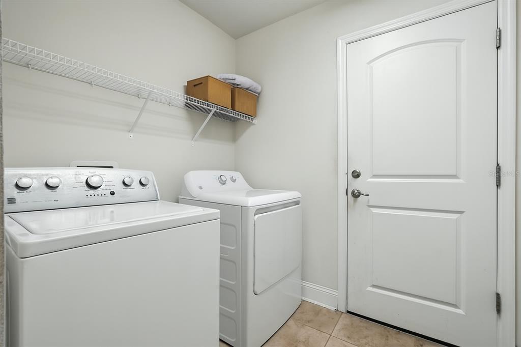 8 Zorro Court Palm Coast, FL 32164 - Photo 30 of 43 a utility room with dryer and washer