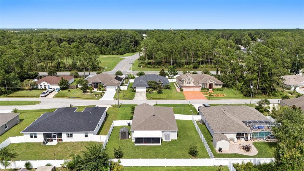 8 Zorro Court Palm Coast, FL 32164 - Photo 36 of 43 an aerial view of a house with garden space and outdoor space
