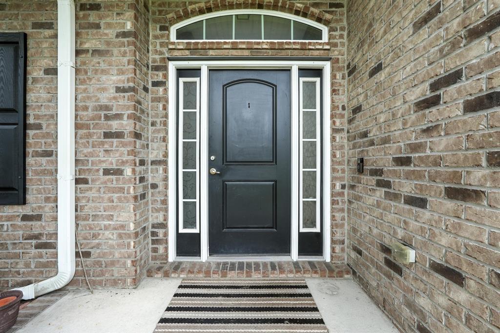 8 Zorro Court Palm Coast, FL 32164 - Photo 4 of 43 a view of a door of the house