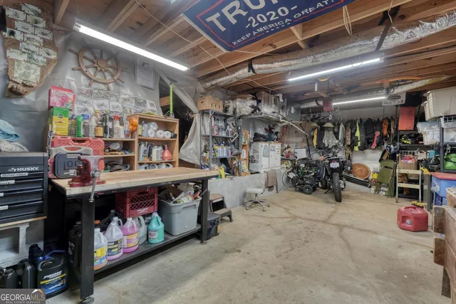 a dining room with furniture window and wooden floor