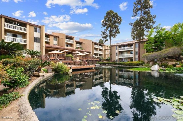 a view of a lake with a building in the background
