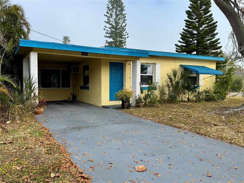 200 10th Avenue North Indian Rocks Beach, FL 33785 - Photo 13 of 15 a view of a house with potted plants