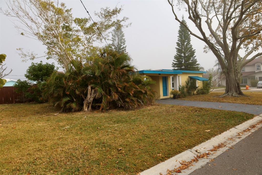 200 10th Avenue North Indian Rocks Beach, FL 33785 - Photo 14 of 15 a view of a house with a yard