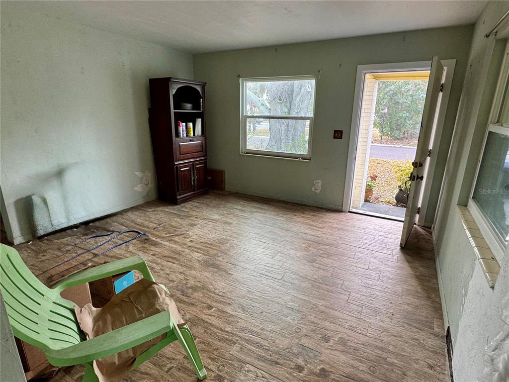 200 10th Avenue North Indian Rocks Beach, FL 33785 - Photo 5 of 15 a living room with furniture and a window
