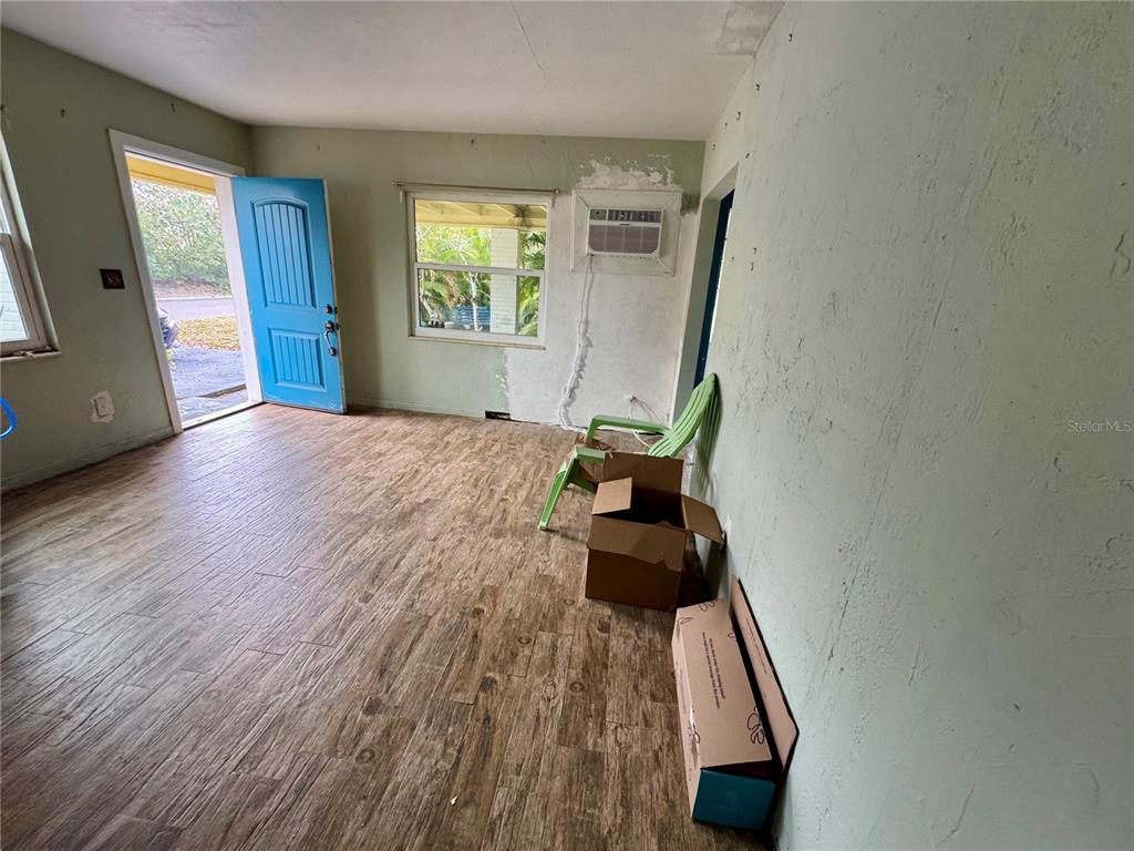 200 10th Avenue North Indian Rocks Beach, FL 33785 - Photo 6 of 15 workspace with wooden floor and windows