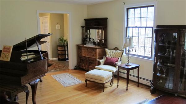 24 Stinson Road Andover, MA 01810 - Photo 11 of 22 a living room with furniture and a window