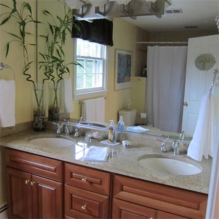 24 Stinson Road Andover, MA 01810 - Photo 14 of 22 a bathroom with a granite countertop sink and a mirror