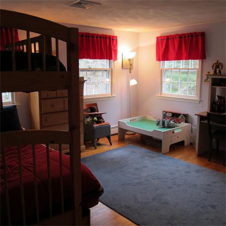 24 Stinson Road Andover, MA 01810 - Photo 16 of 22 a living room with furniture and a window