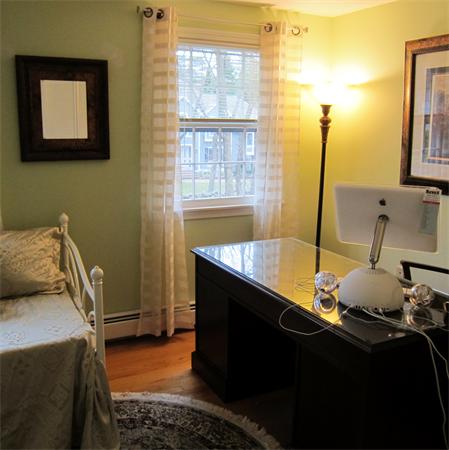 24 Stinson Road Andover, MA 01810 - Photo 17 of 22 a bedroom with a bed and wooden floor