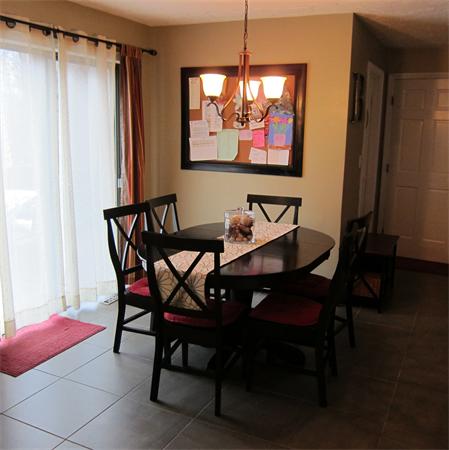 24 Stinson Road Andover, MA 01810 - Photo 6 of 22 a view of a dining room with furniture and chandelier
