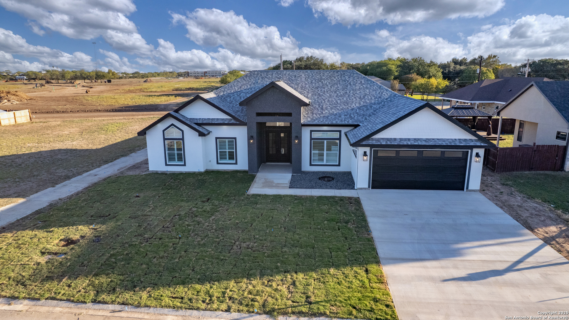 14 Hope Place Uvalde, TX 78801 - Photo 33 of 38 a front view of a house with a garden