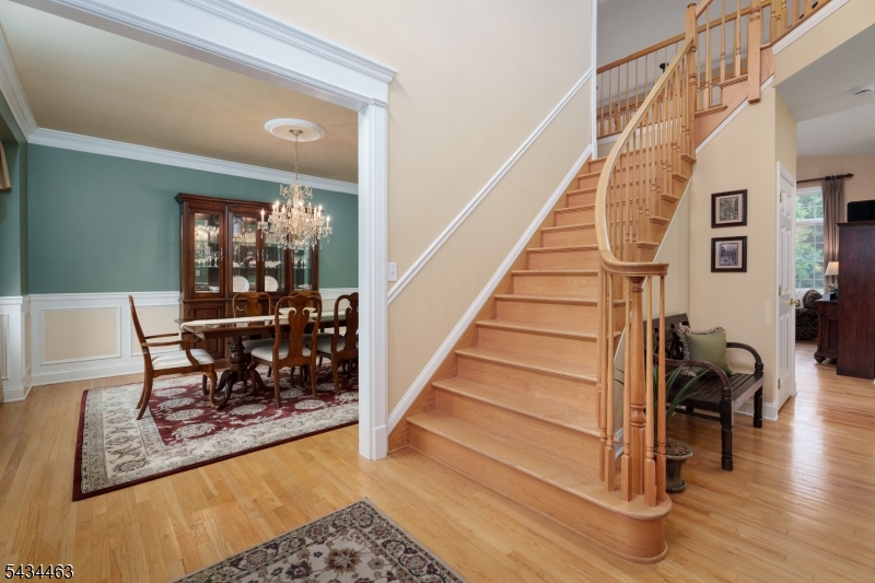 110 Orchard Road Skillman, NJ 08558 - Photo 3 of 43 a view of a livingroom and dining room and wooden floor