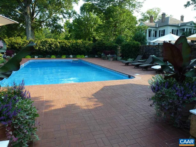a view of a garden with a fountain