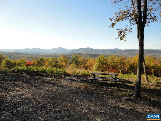 a view of a table with chairs in patio