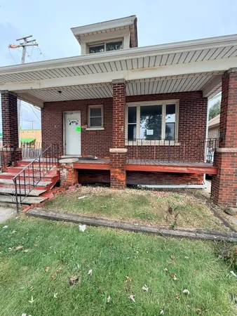a view of house with outdoor seating