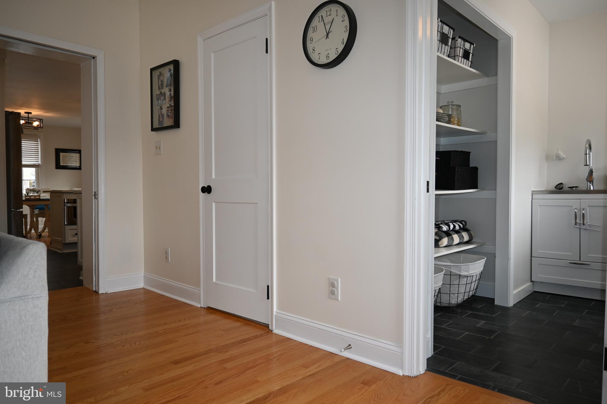 514 Springview Lane Springfield, PA 19064 - Photo 12 of 33 a view of a hallway to rooms and wooden floor