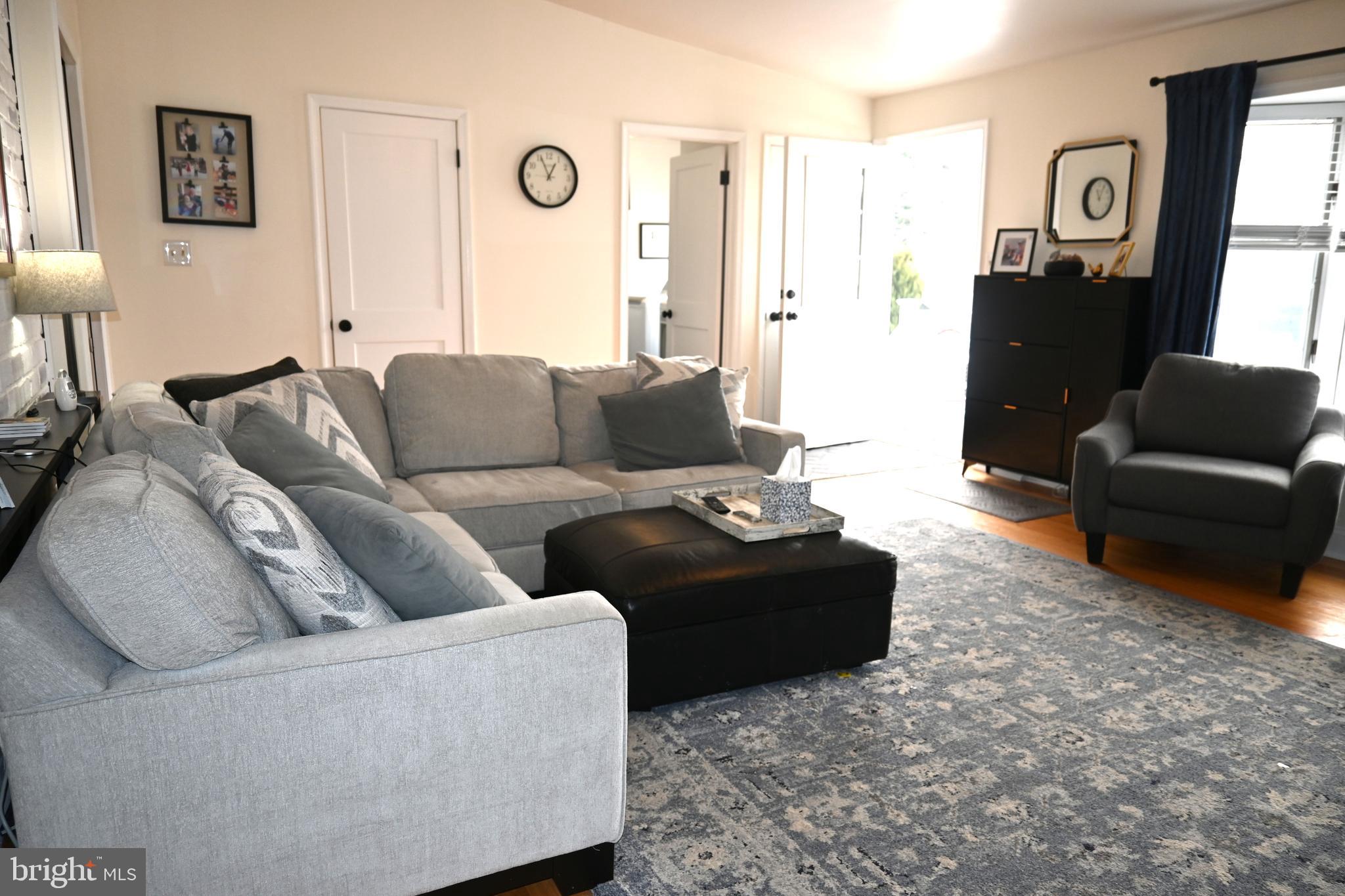 514 Springview Lane Springfield, PA 19064 - Photo 15 of 33 a living room with furniture and a window
