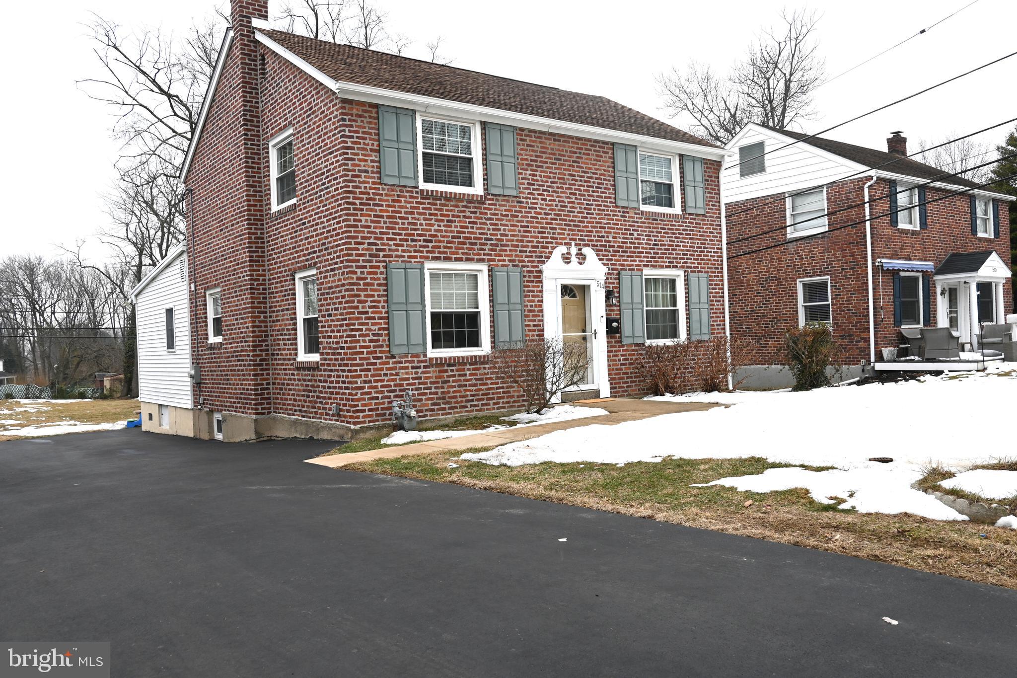 514 Springview Lane Springfield, PA 19064 - Photo 2 of 33 a view of a house with a snow on the road