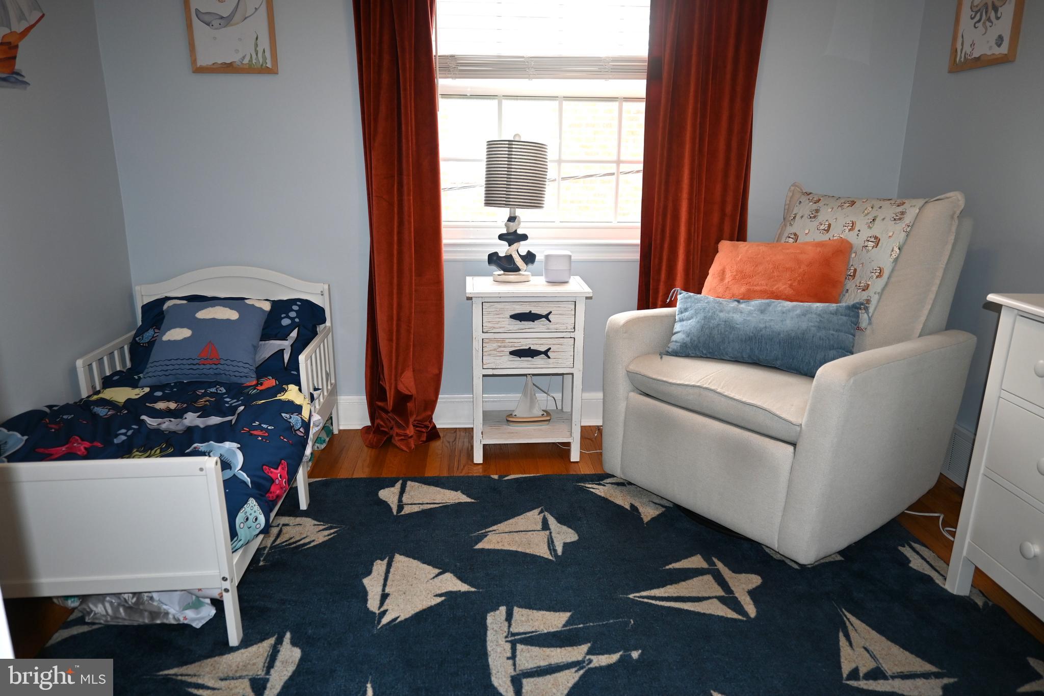 514 Springview Lane Springfield, PA 19064 - Photo 25 of 33 a room with furniture and a window