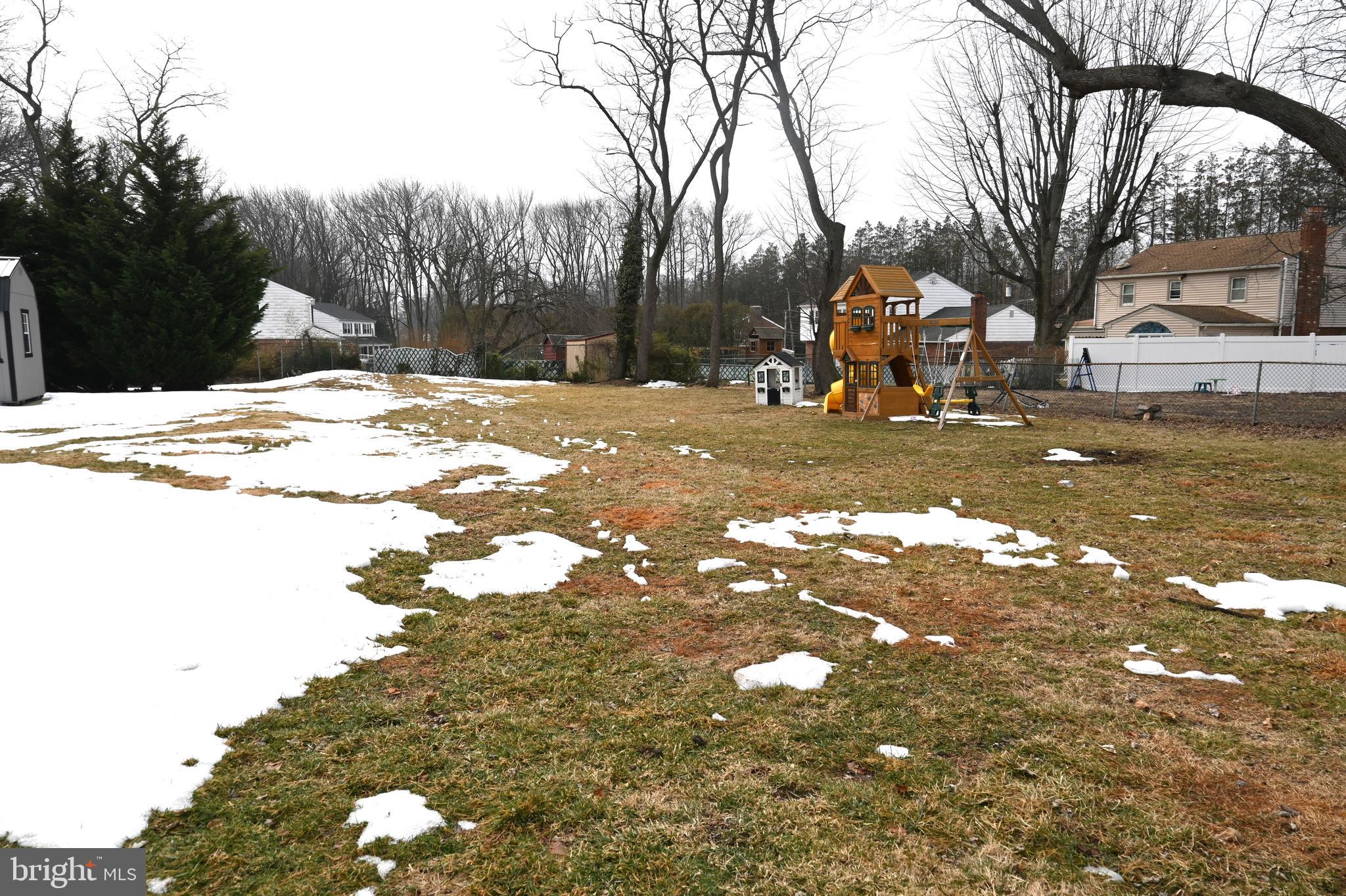 514 Springview Lane Springfield, PA 19064 - Photo 31 of 33 a view of road with trees