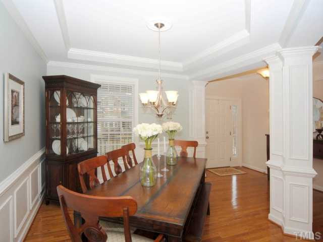 306 Brandywine Drive Raleigh, NC 27607 - Photo 6 of 18 Formal dining room with trey ceiling opens to entry foyer.