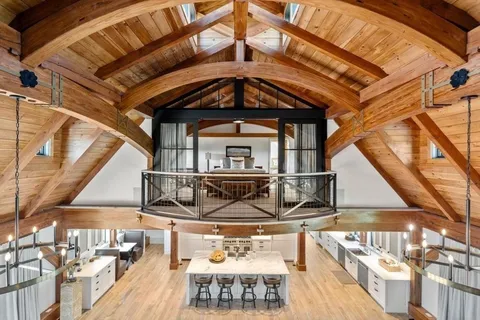 a view of a balcony with wooden floor