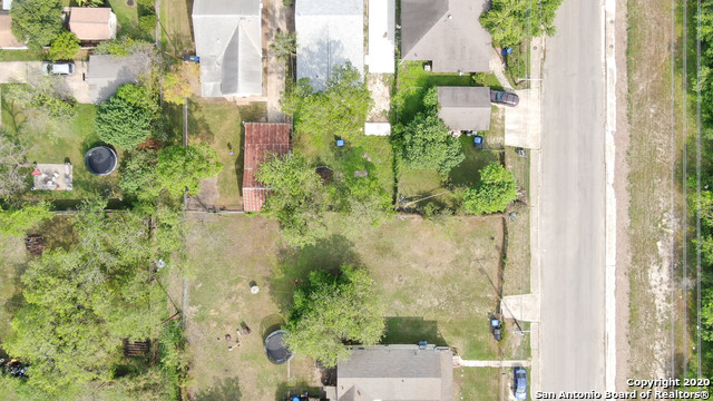 an aerial view of residential house with plants