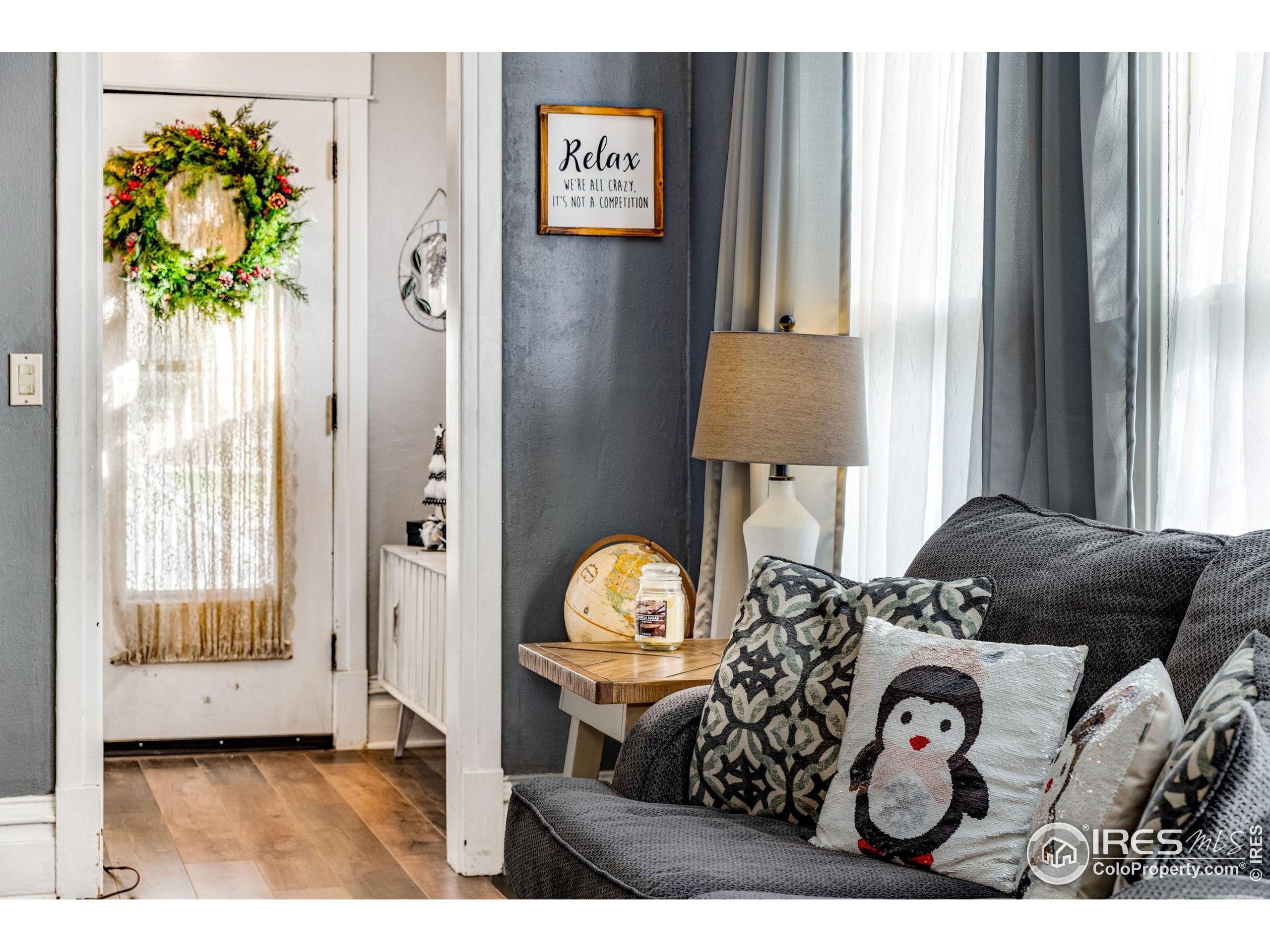 501 Maple Street Fort Morgan, CO 80701 - Photo 7 of 46 a bedroom with a bed and a window