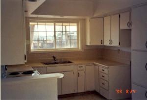 2813 Birchfield Road Yakima, WA 98901 - Photo 6 of 9 a kitchen with a sink cabinets and window