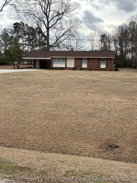 1523 Proctorville Church Road Proctorville, NC 28369 - Photo 1 of 34 a view of a house with a yard