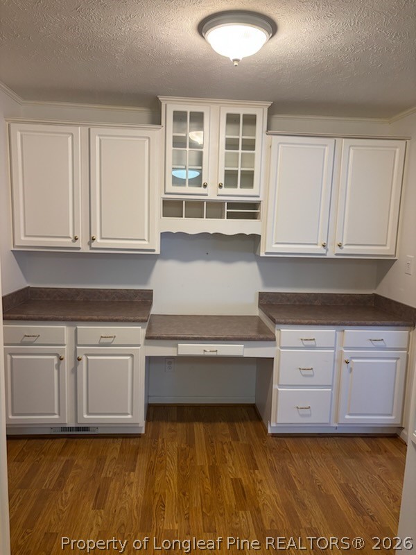 1523 Proctorville Church Road Proctorville, NC 28369 - Photo 15 of 35 a kitchen with granite countertop white cabinets and stainless steel appliances