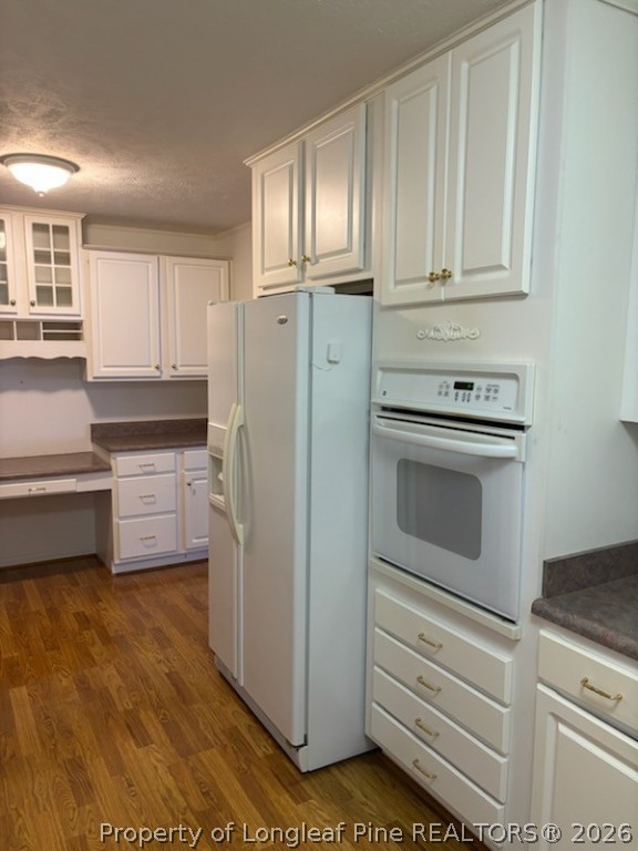 1523 Proctorville Church Road Proctorville, NC 28369 - Photo 19 of 34 a kitchen with granite countertop white cabinets and stainless steel appliances