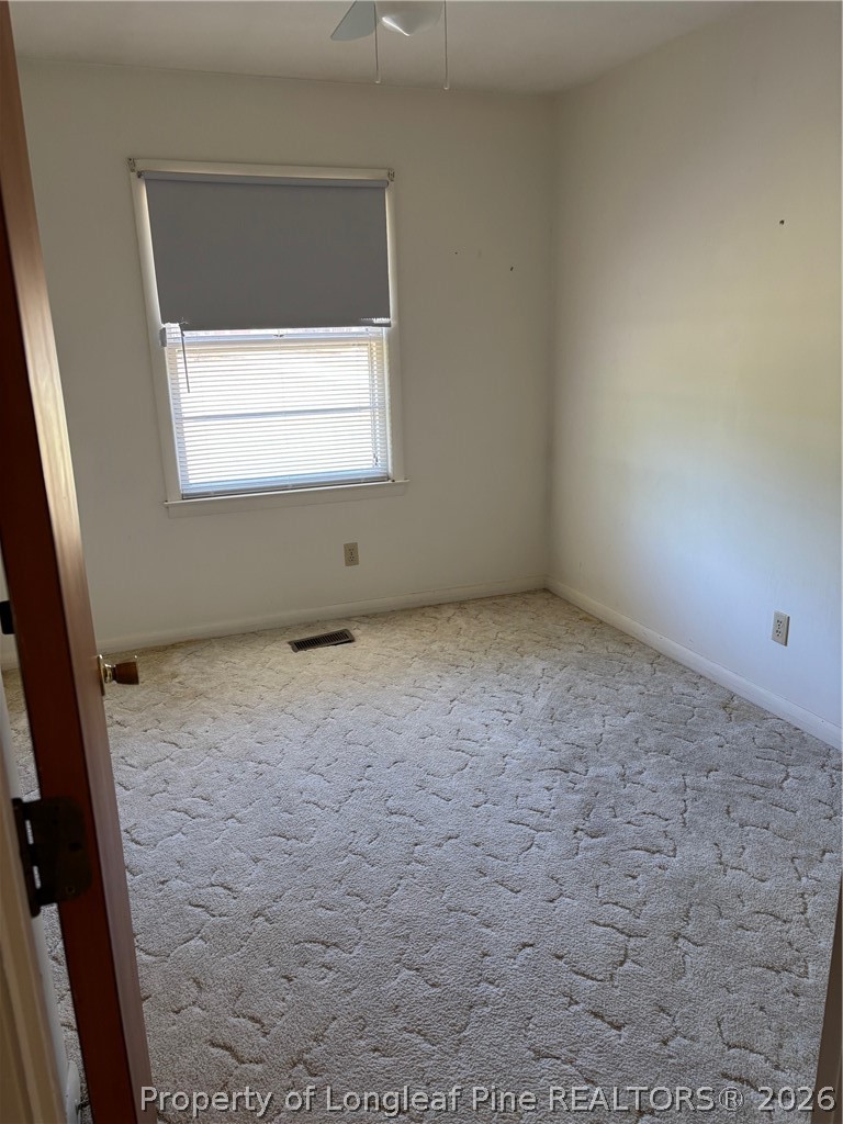 1523 Proctorville Church Road Proctorville, NC 28369 - Photo 23 of 35 an empty room with a window