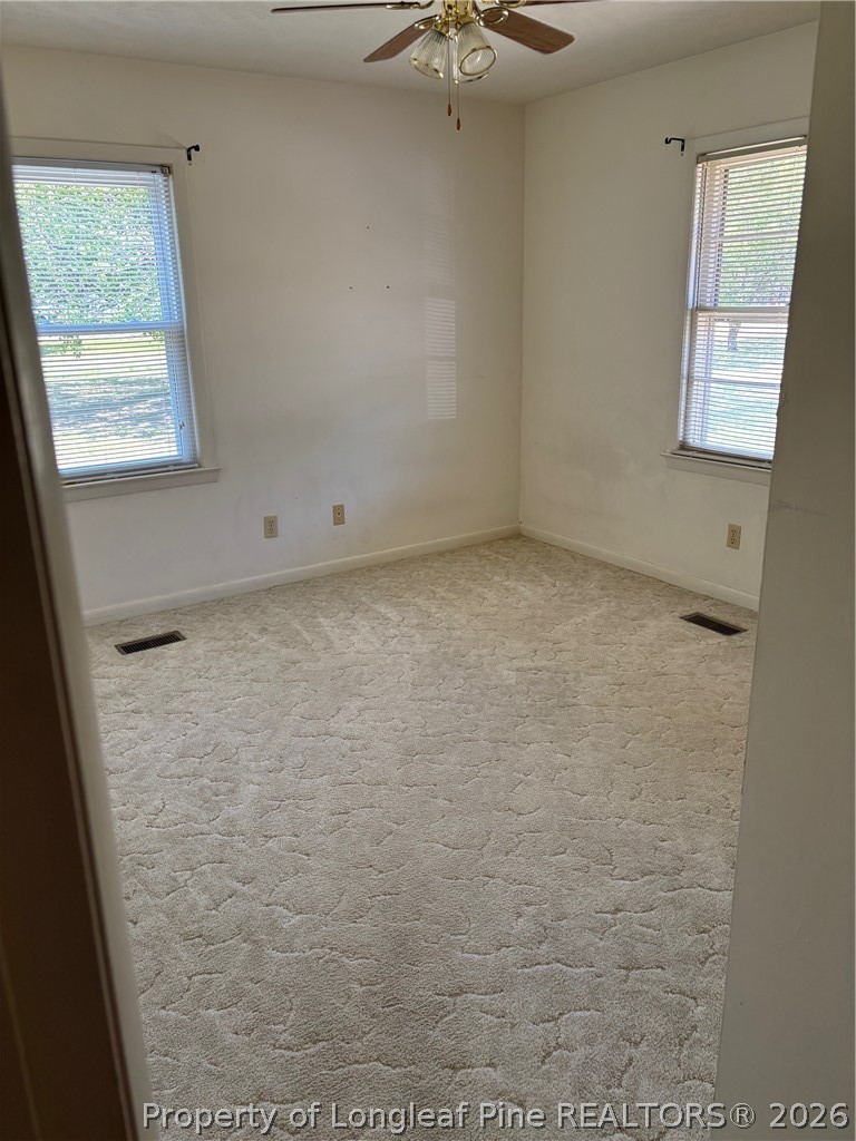 1523 Proctorville Church Road Proctorville, NC 28369 - Photo 24 of 35 a view of a window in an empty room