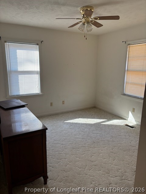 1523 Proctorville Church Road Proctorville, NC 28369 - Photo 27 of 34 an empty room with windows