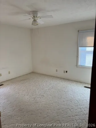 a room with furniture and window