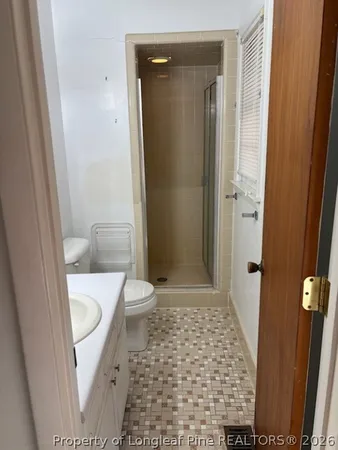 a view of water heater and a cabinet