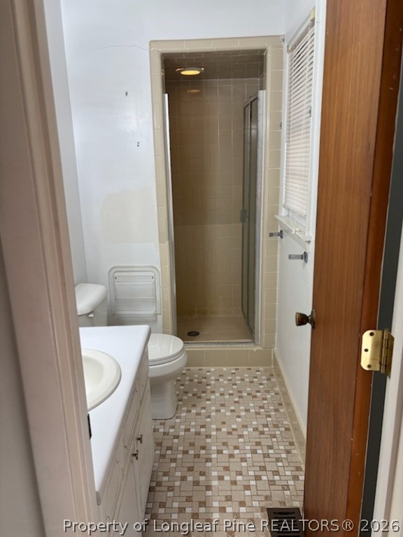 1523 Proctorville Church Road Proctorville, NC 28369 - Photo 30 of 34 a bathroom with a toilet and a shower