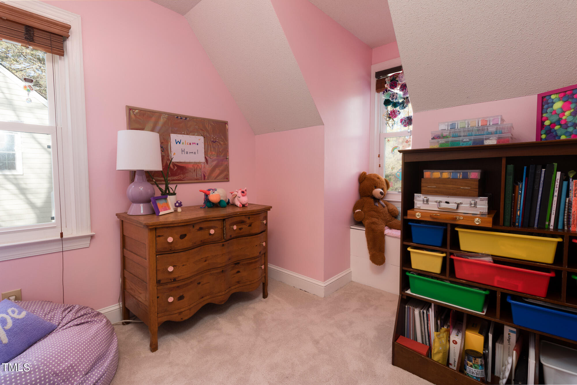 8832 Campfire Trail Raleigh, NC 27615 - Photo 13 of 19 a room with furniture and a window