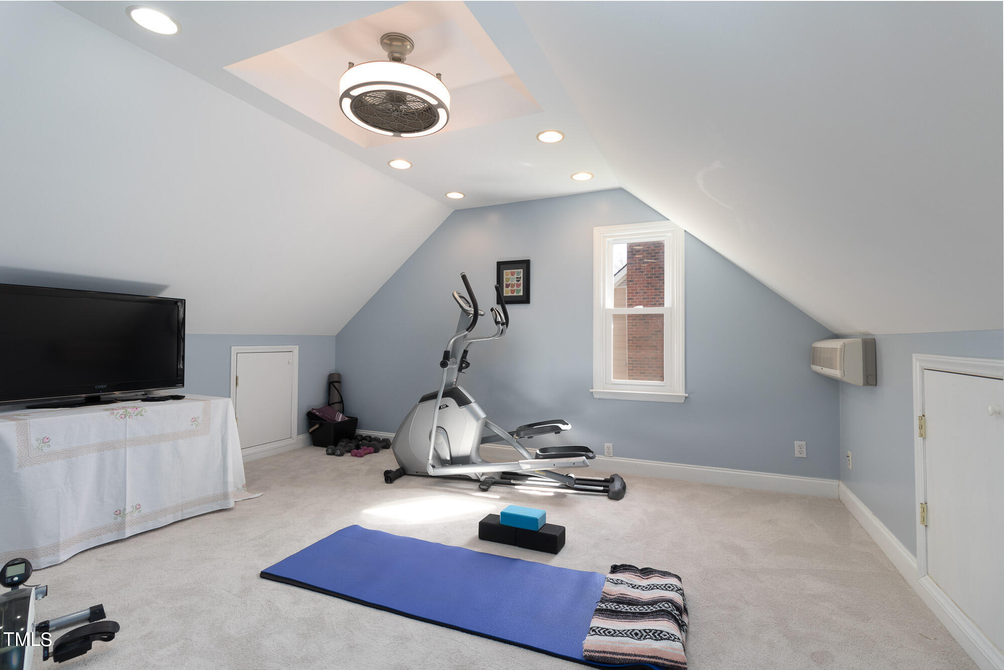 8832 Campfire Trail Raleigh, NC 27615 - Photo 15 of 19 a living room with furniture and a flat screen tv
