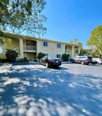 a car parked in front of a house