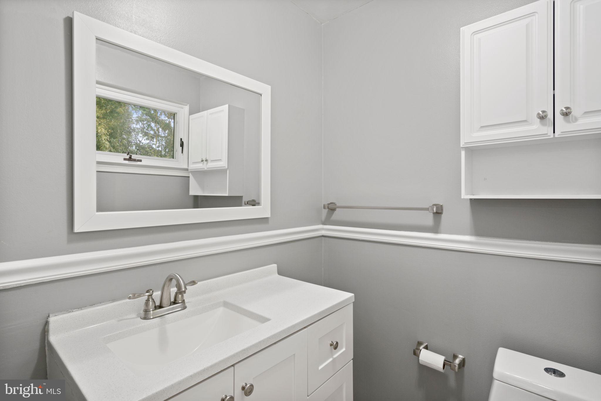 5615 Rolling Road Springfield, VA 22151 - Photo 19 of 56 Updated Powder room off the kitchen