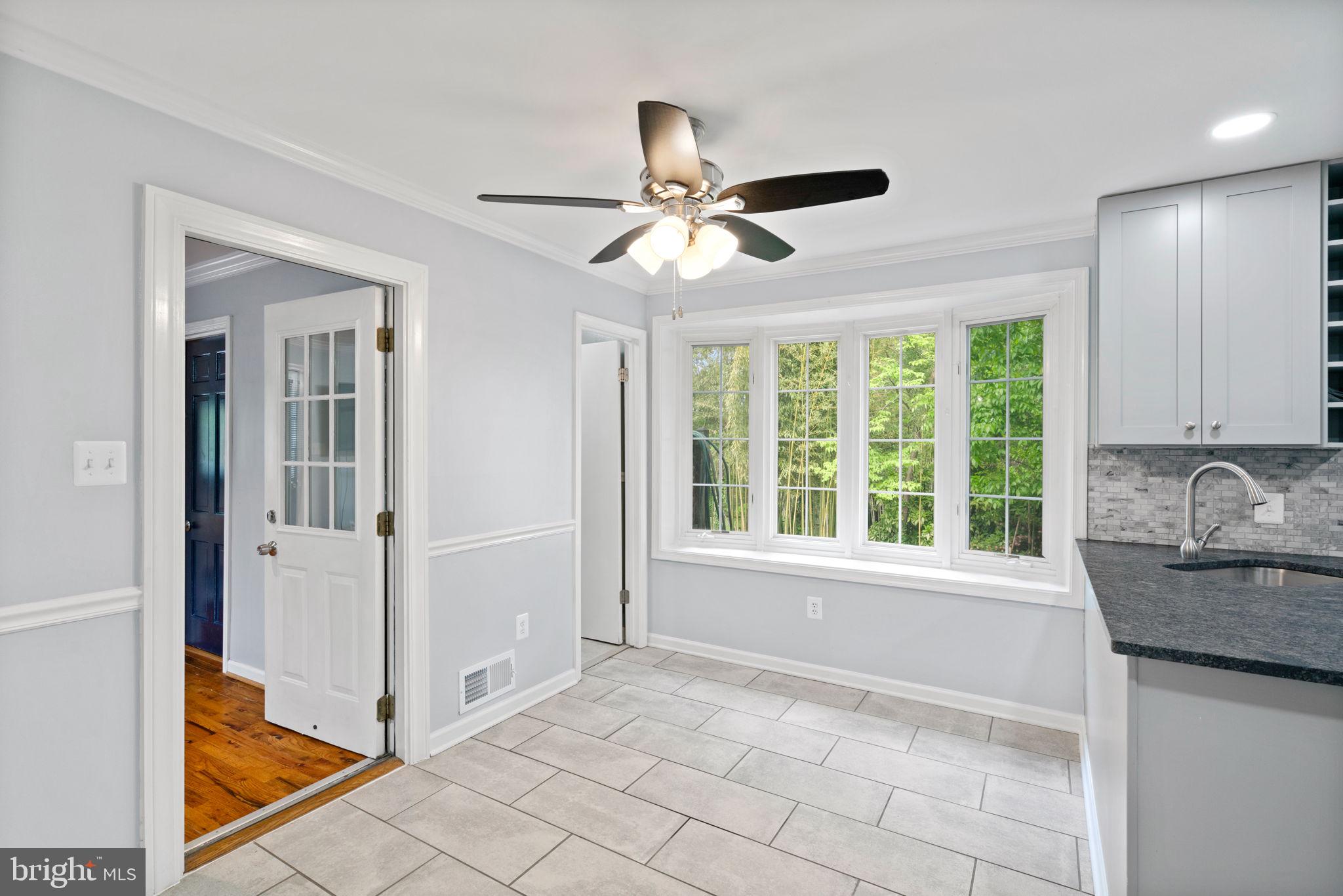 5615 Rolling Road Springfield, VA 22151 - Photo 23 of 56 Enjoy the back yard from the eat in kitchen