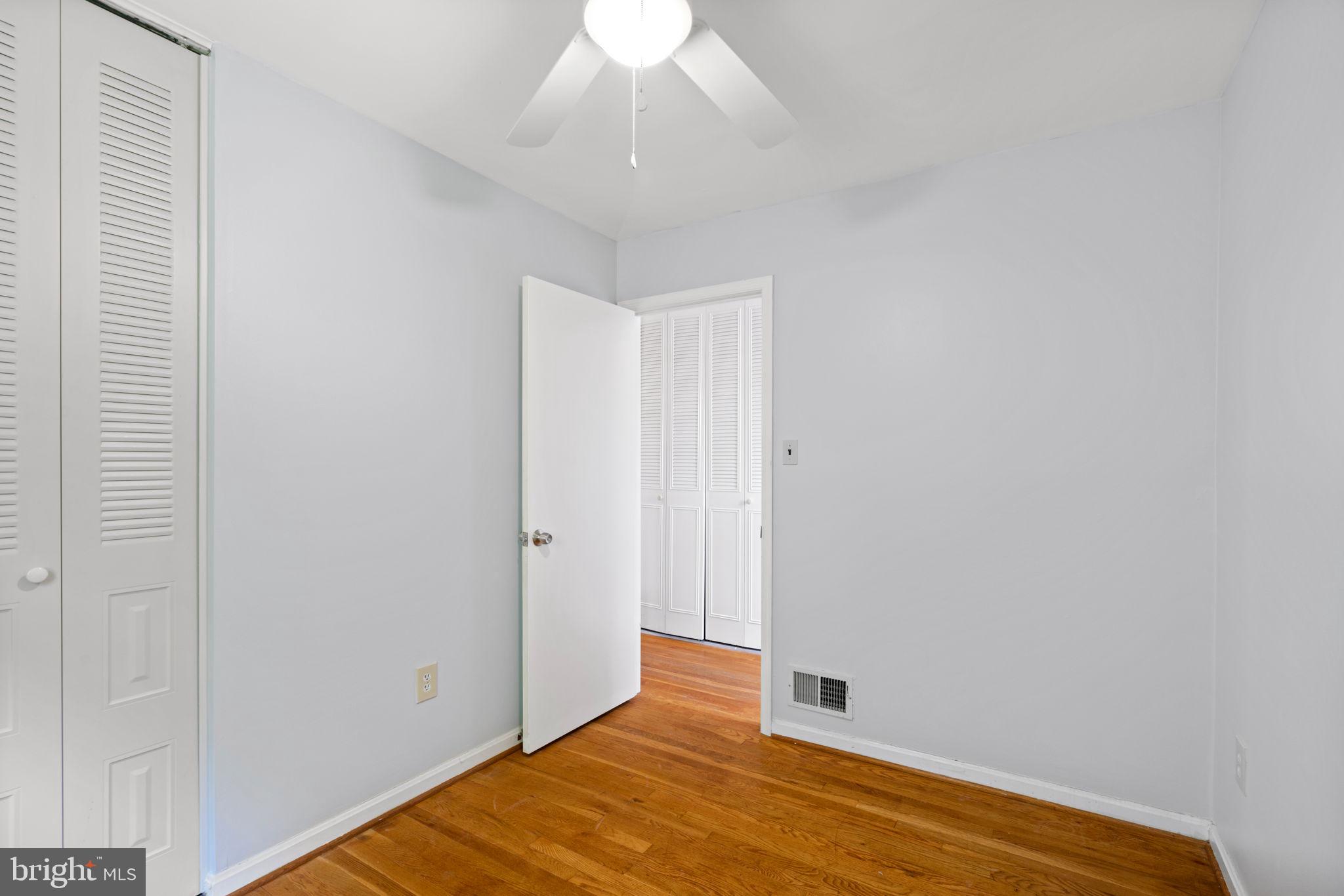 5615 Rolling Road Springfield, VA 22151 - Photo 26 of 56 Bedroom 2 at the top of the stairs