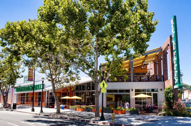 a view of a swimming pool with a lounge chairs