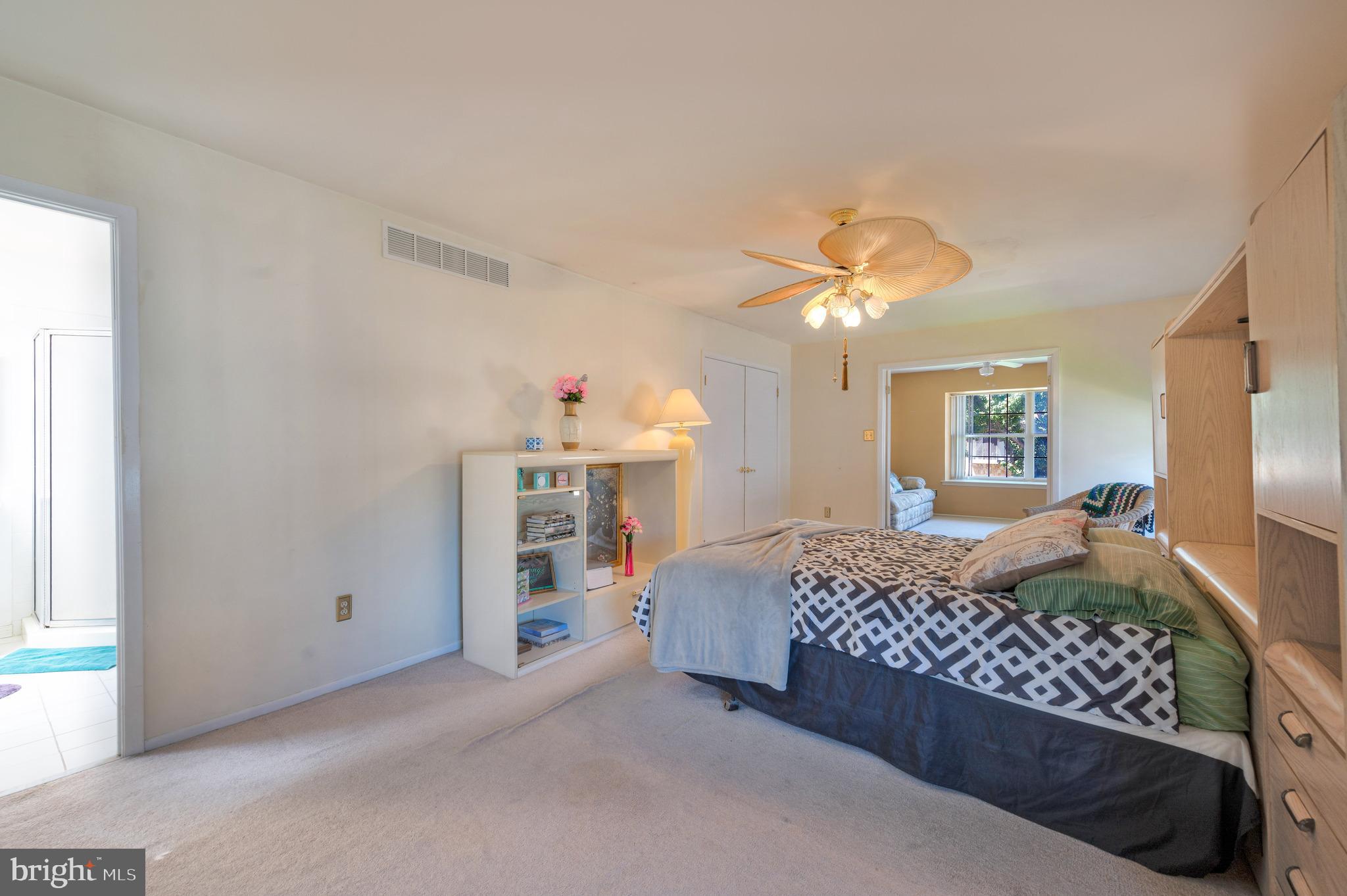 13360 Susan Terrace Philadelphia, PA 19116 - Photo 13 of 29 a bedroom with a bed and a chandelier