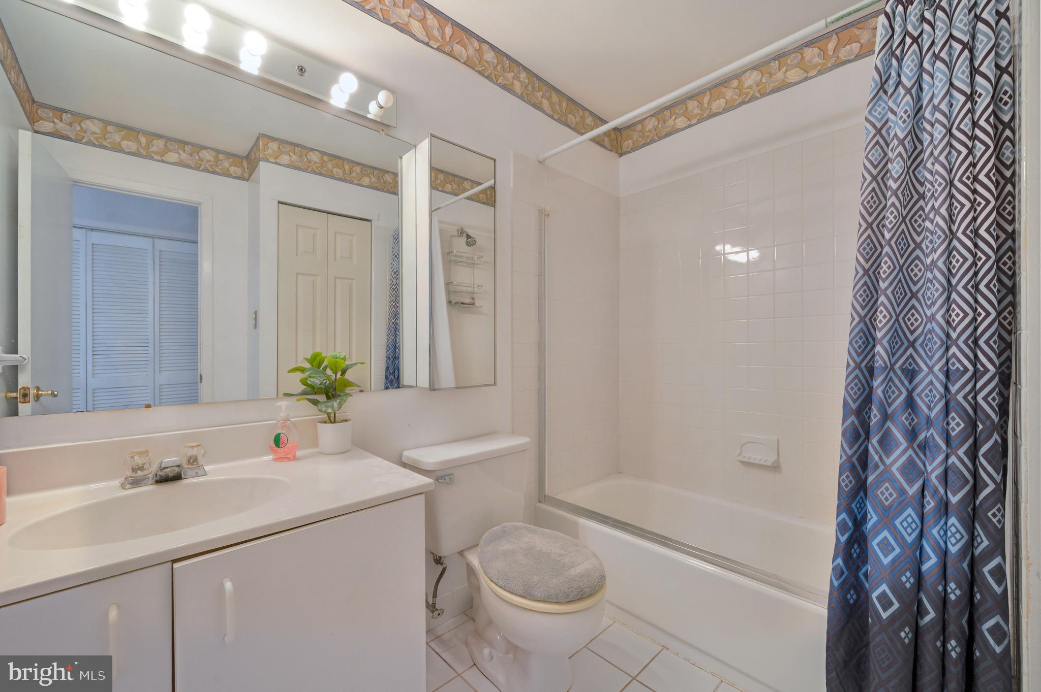 13360 Susan Terrace Philadelphia, PA 19116 - Photo 18 of 29 a bathroom with a granite countertop sink toilet and shower